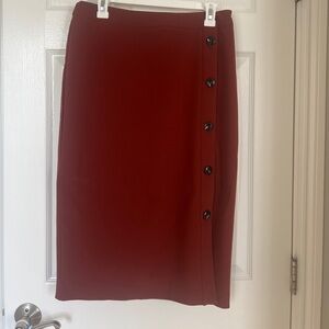 A-line/pencil skirt with button slit.